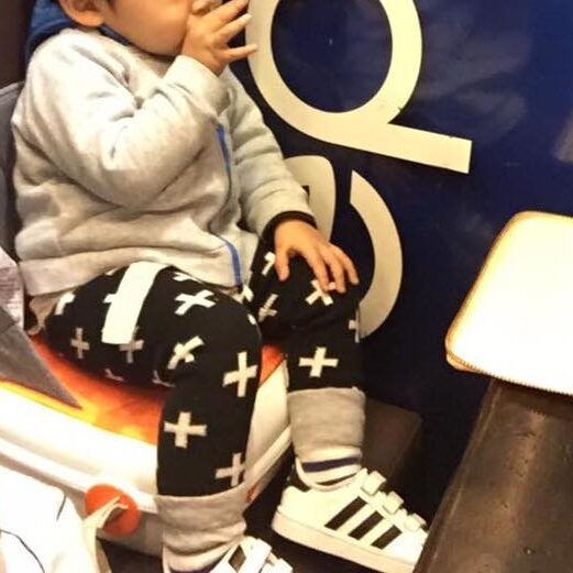 Baby Z in his booster seat at New Village. 